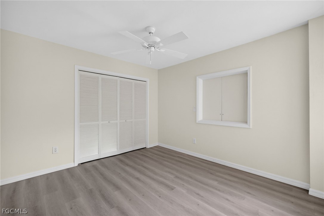 1312 Par View Drive Sanibel, FL 33957 - Photo 22 of 45 wooden floor in an empty room