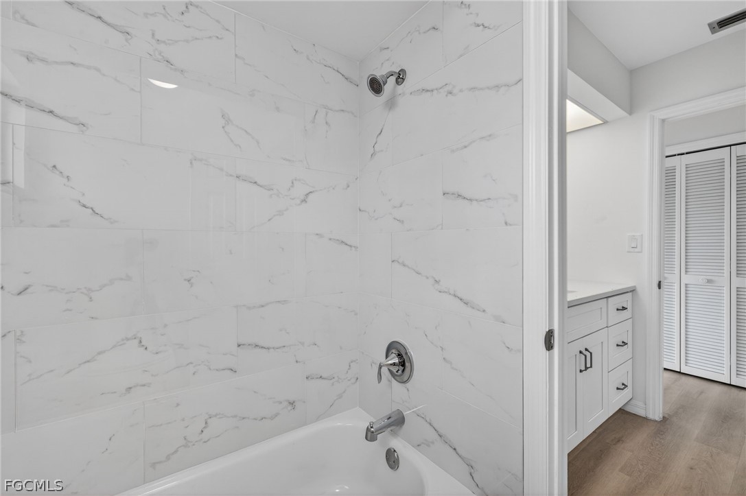 1312 Par View Drive Sanibel, FL 33957 - Photo 24 of 45 a bathroom with a bathtub and shower