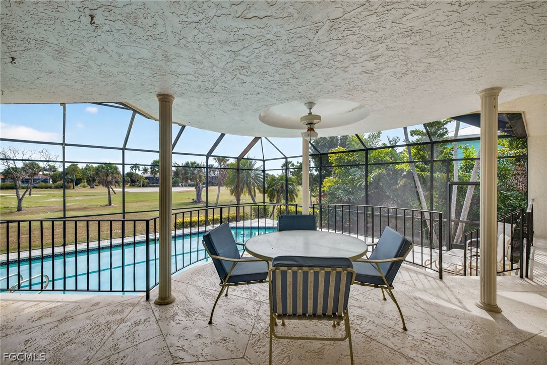 1312 Par View Drive Sanibel, FL 33957 - Photo 25 of 45 a view of a balcony with a potted plant and outdoor seating