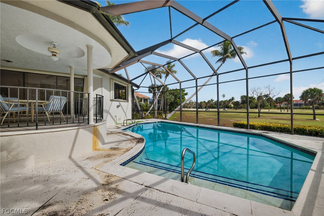 1312 Par View Drive Sanibel, FL 33957 - Photo 28 of 45 a view of a swimming pool with a patio and a tub