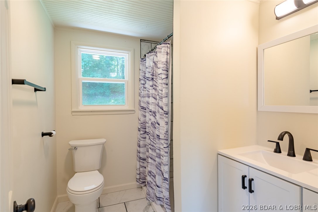 2486 Lick Creek Road Edwards, MO 65326 - Photo 16 of 39 New shower, sink and vanity