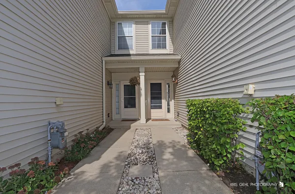 a front view of a house with a porch