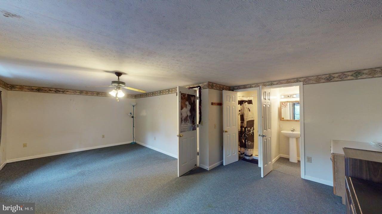 575 North River Highlands Road Delray, WV 26714 - Photo 40 of 48 Spacious room with versatile layout.