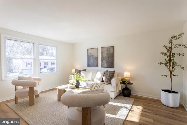 a kitchen with a table and chairs in it