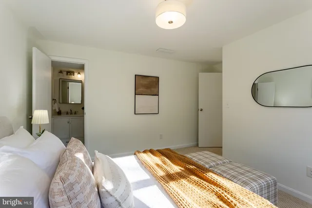 wooden floor in an empty room with a fireplace