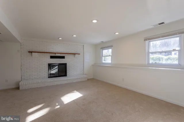 an empty room that has a window