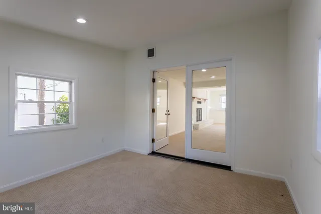 a view of backyard with green space