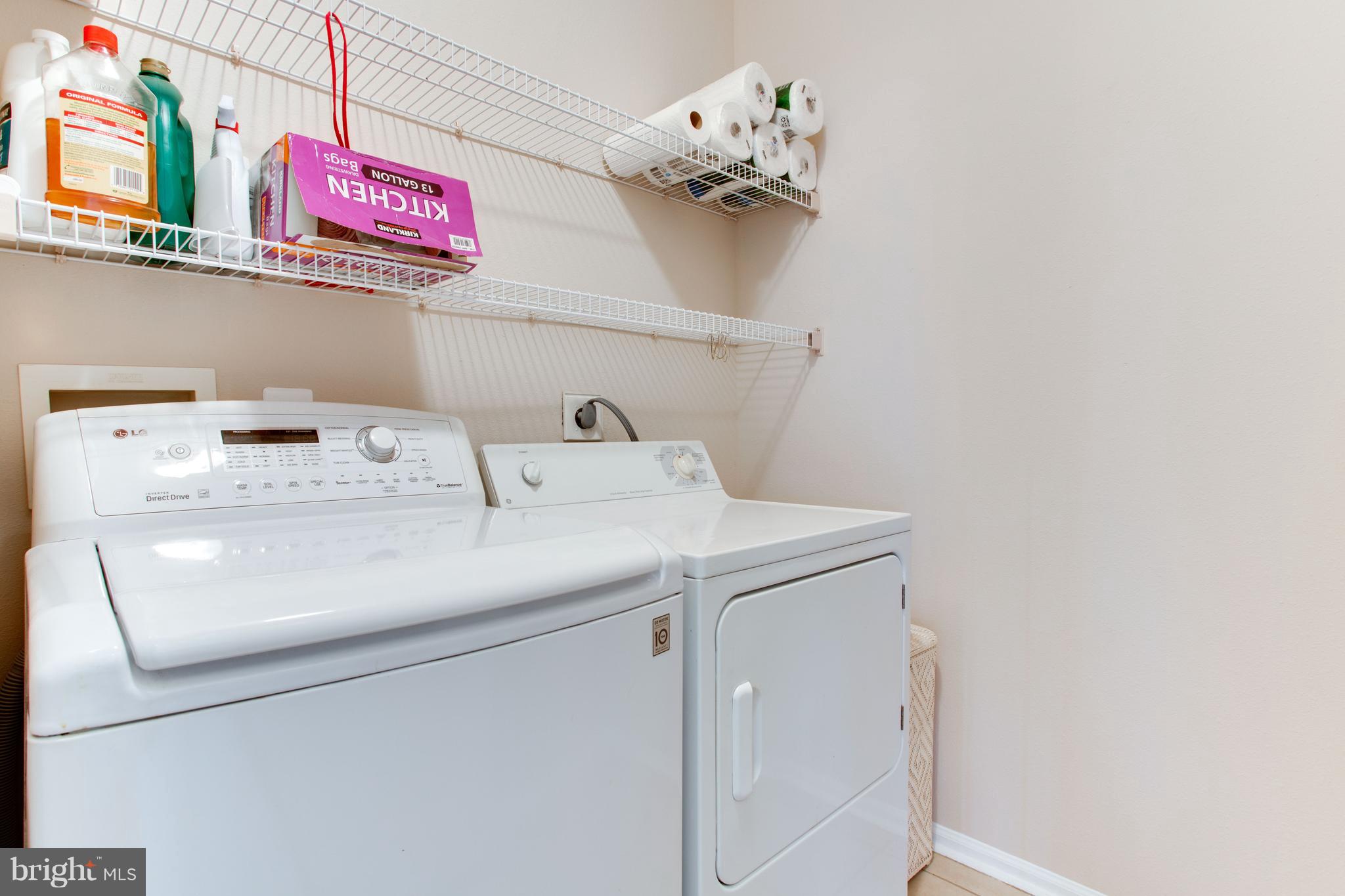 1600 Spring Gate Dr., Unit 2207 McLean, VA 22102 - Photo 23 of 29 a utility room with dryer and washer