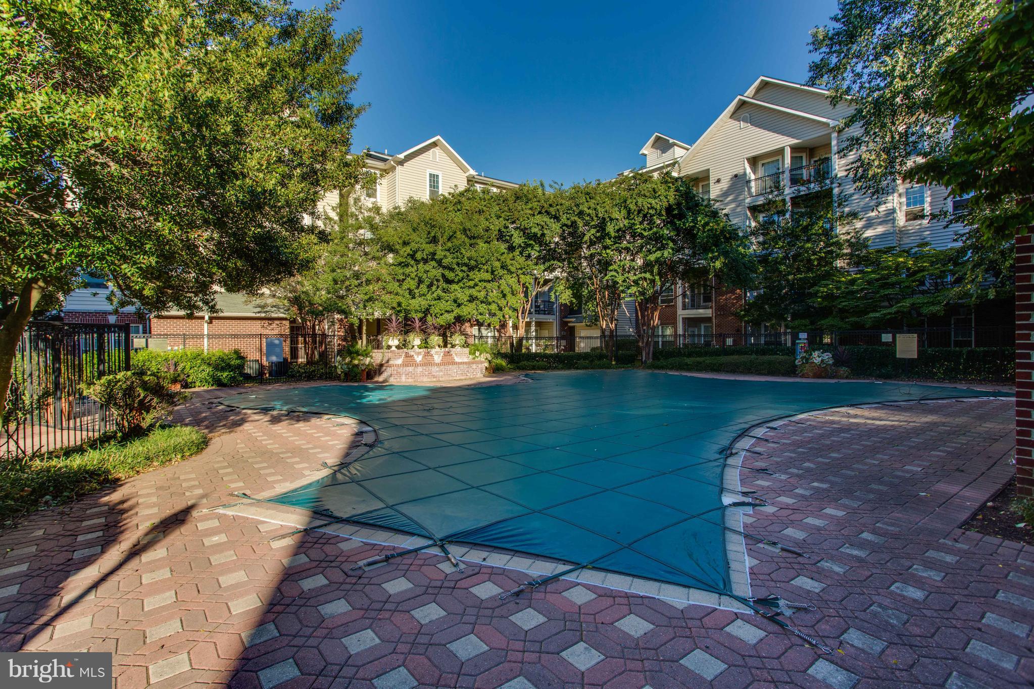 1600 Spring Gate Dr., Unit 2207 McLean, VA 22102 - Photo 25 of 29 a view of a street with houses on both side