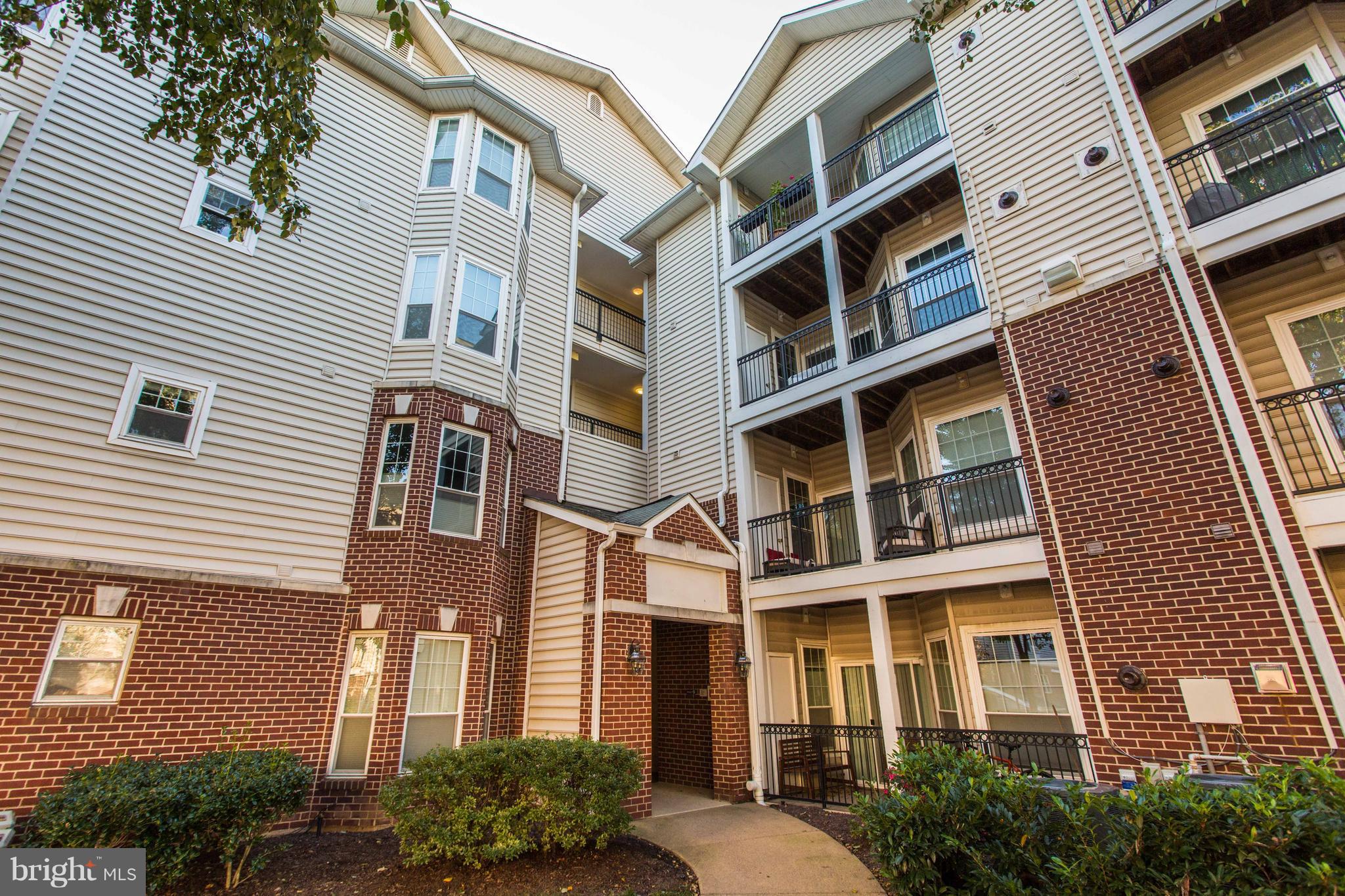 1600 Spring Gate Dr., Unit 2207 McLean, VA 22102 - Photo 28 of 29 a front view of a multi story building