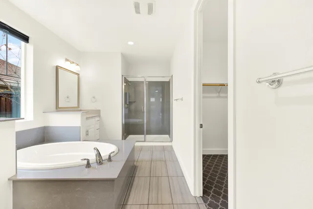 a view of a kitchen with a sink and a stove top oven