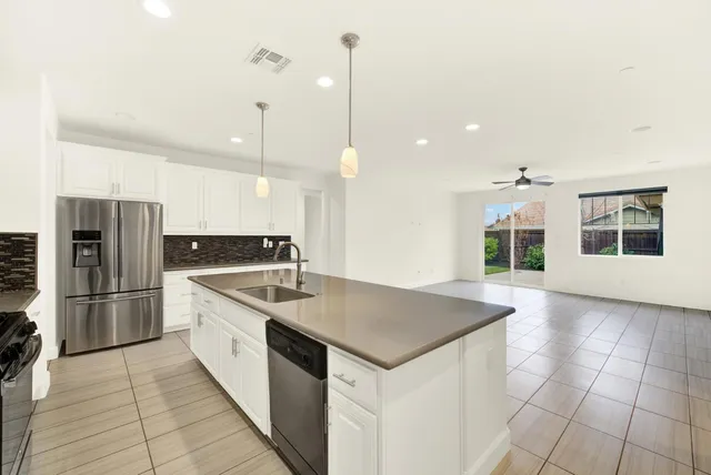 a aerial view of a house with a garden and plants