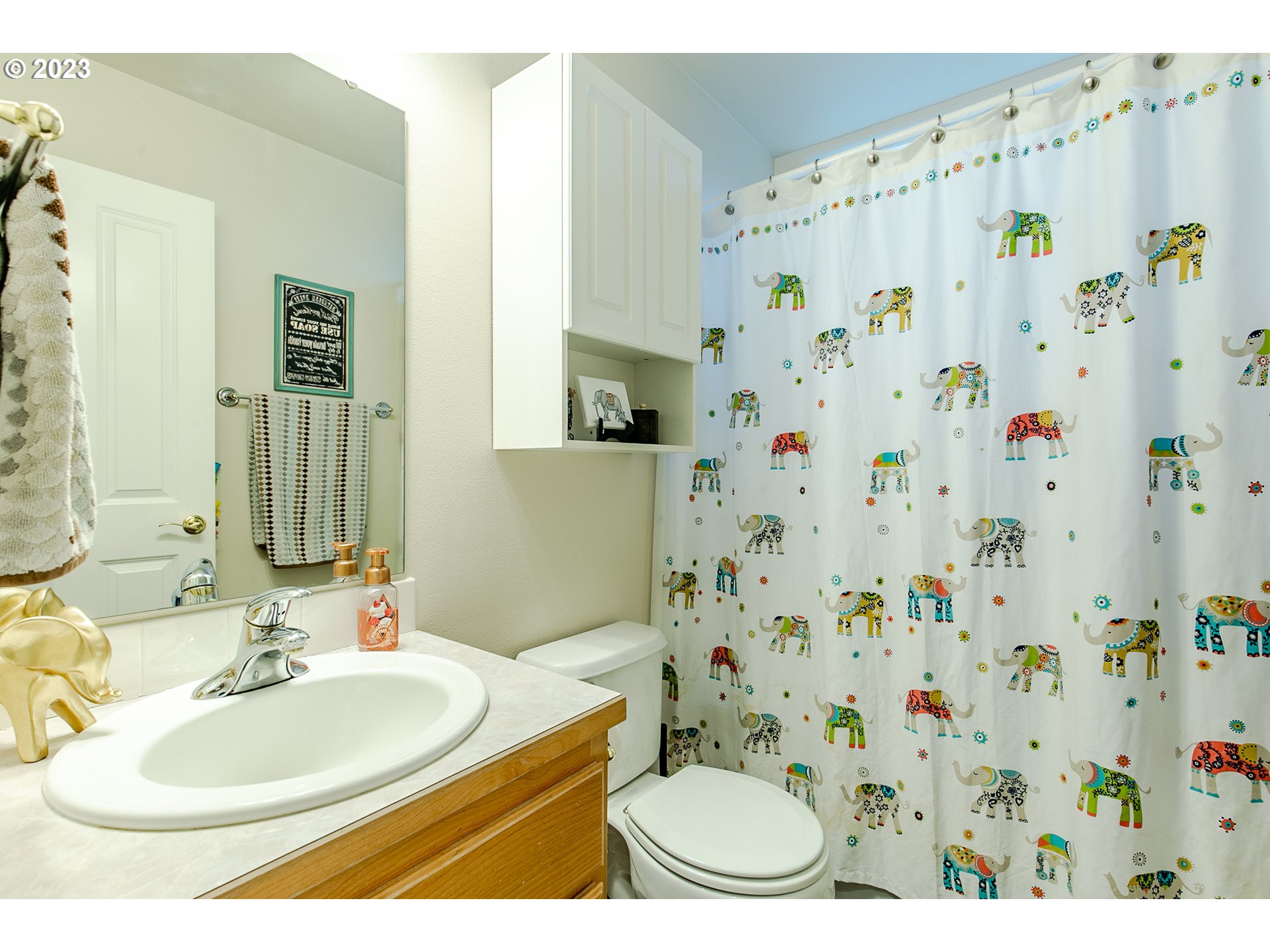 2353 35th Street Springfield, OR 97477 - Photo 14 of 32 a bathroom with a sink toilet and shower