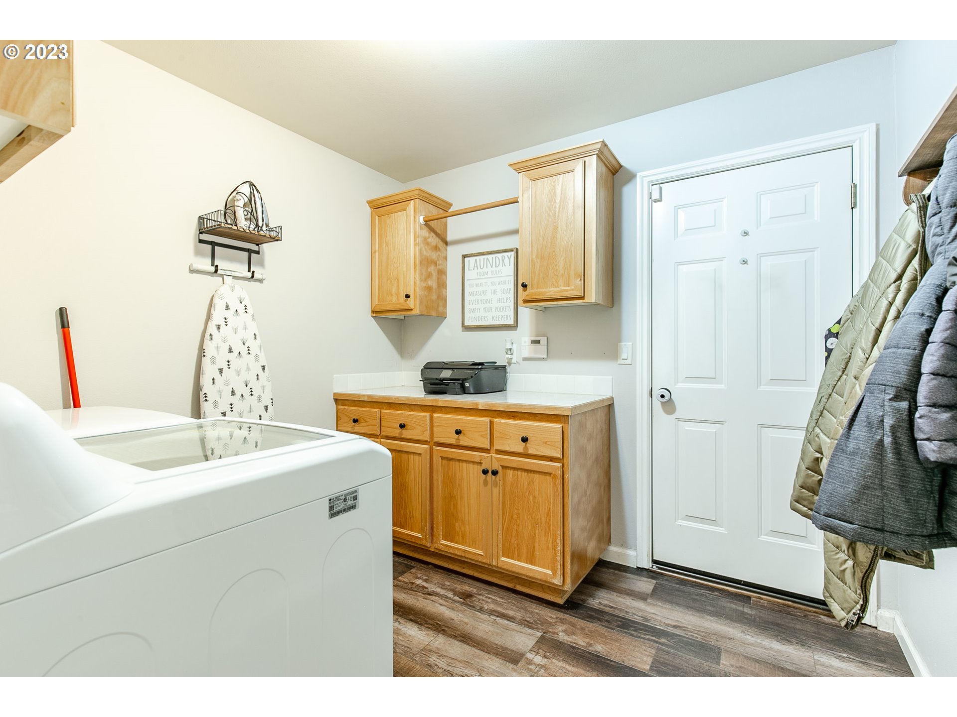 2353 35th Street Springfield, OR 97477 - Photo 17 of 32 a bathroom with a sink a mirror and a shower