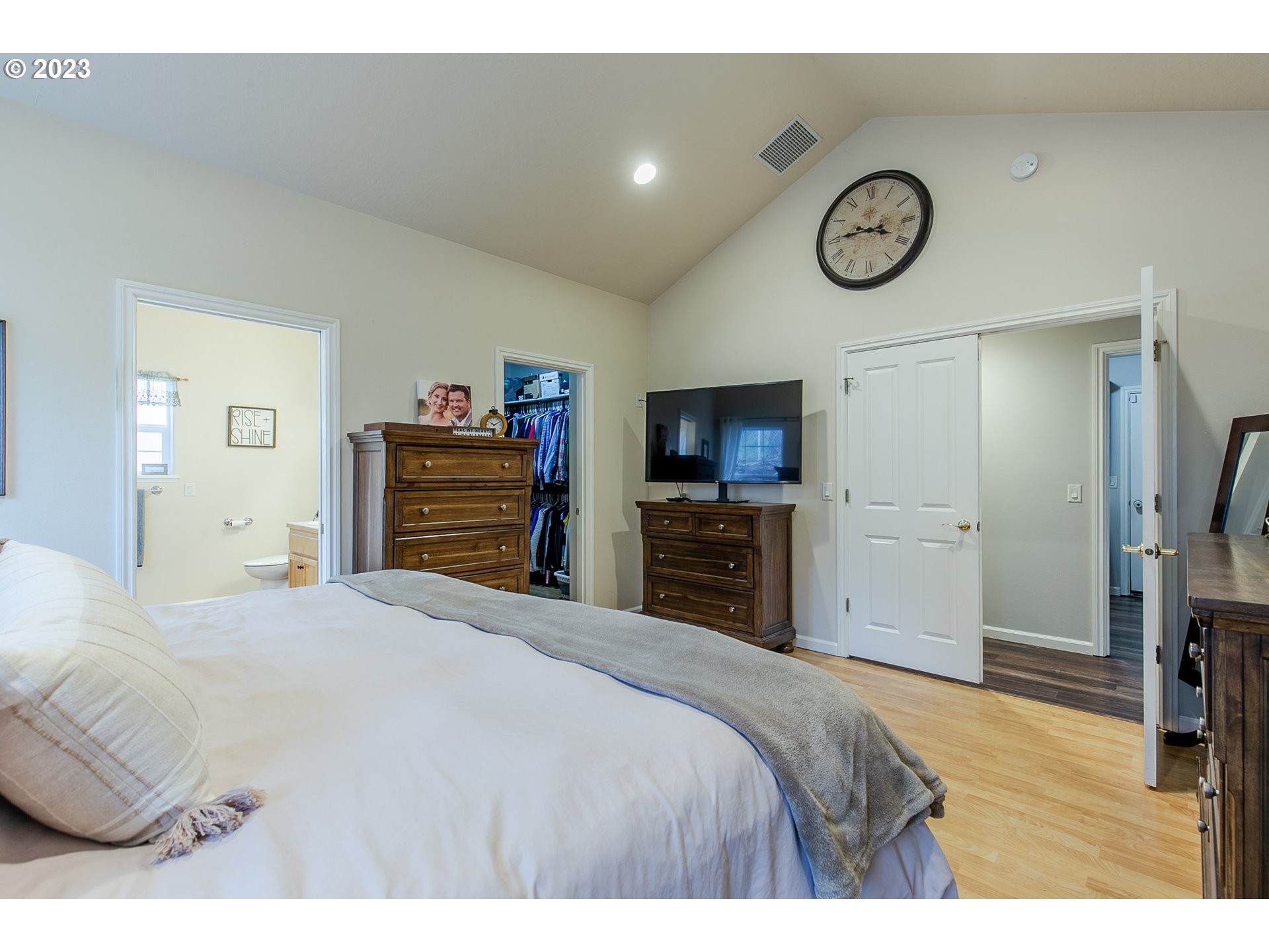 2353 35th Street Springfield, OR 97477 - Photo 21 of 32 a bedroom with a bed and a television