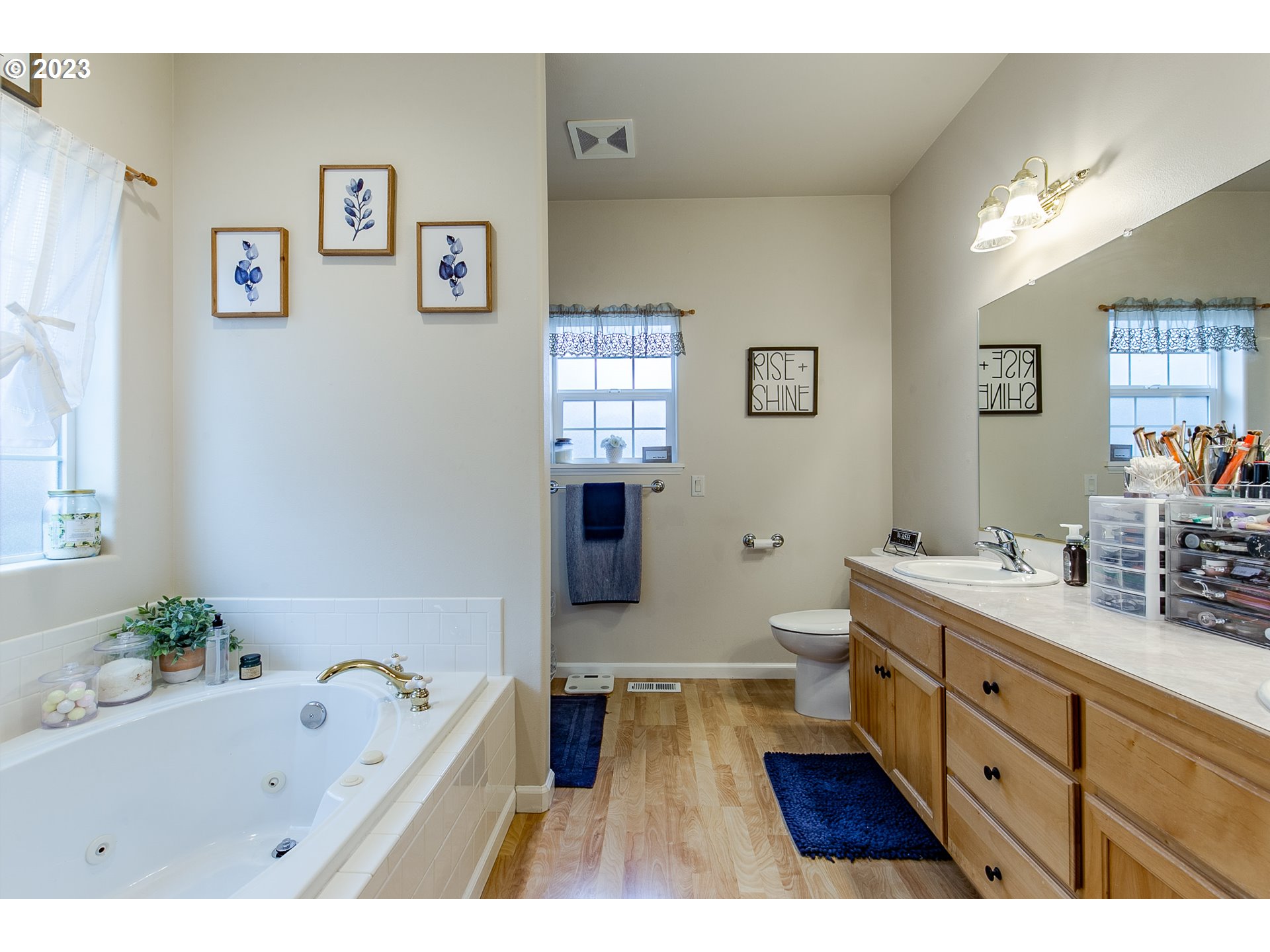 2353 35th Street Springfield, OR 97477 - Photo 22 of 32 a spacious bathroom with a tub sink double vanity granite and a bathtub