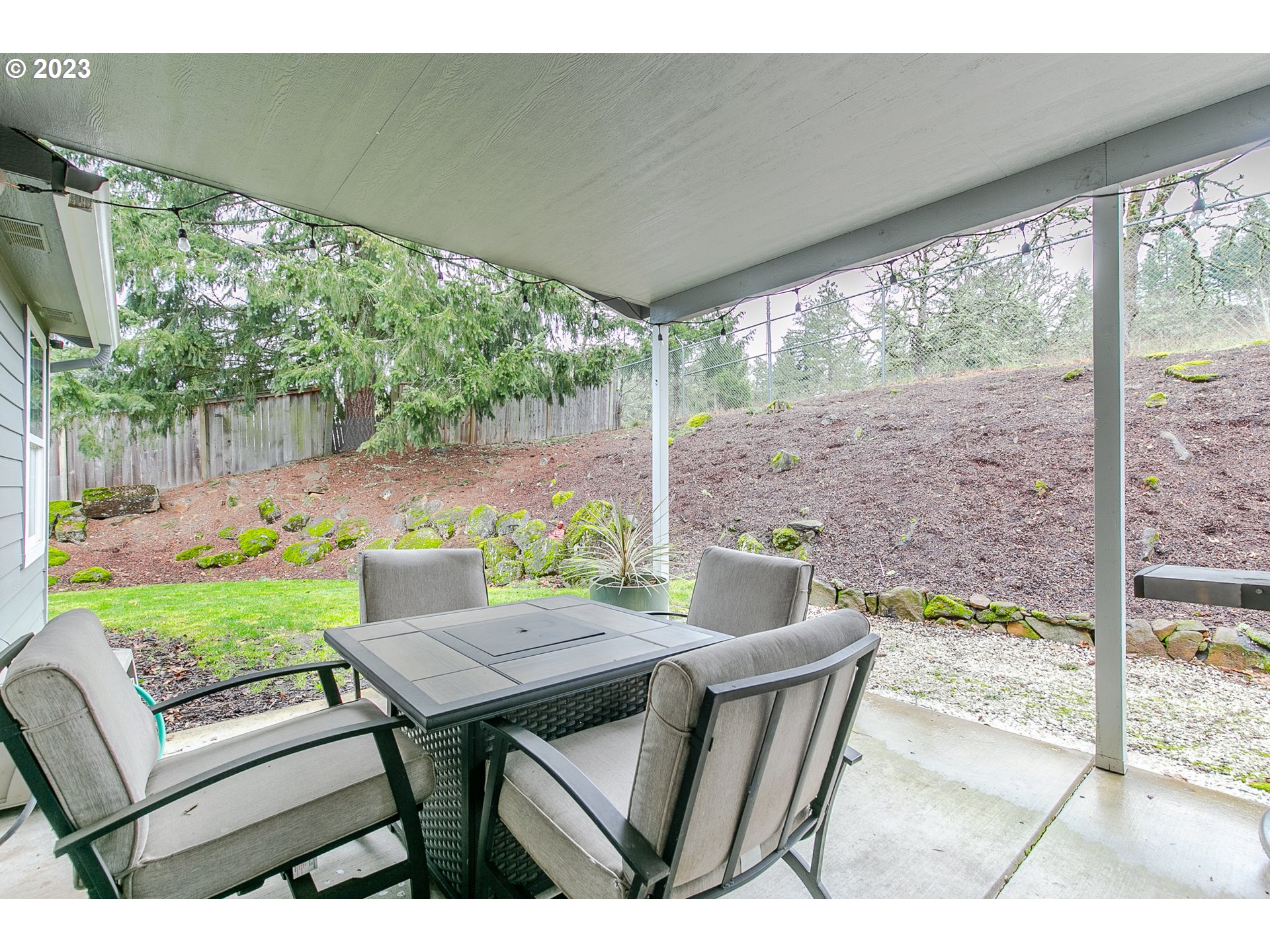2353 35th Street Springfield, OR 97477 - Photo 30 of 32 a backyard of a house with table and chairs
