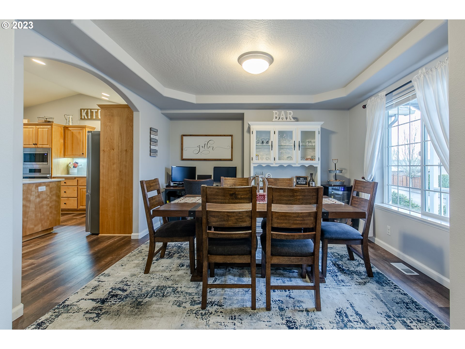 2353 35th Street Springfield, OR 97477 - Photo 7 of 32 a view of a dining room with furniture and wooden floor