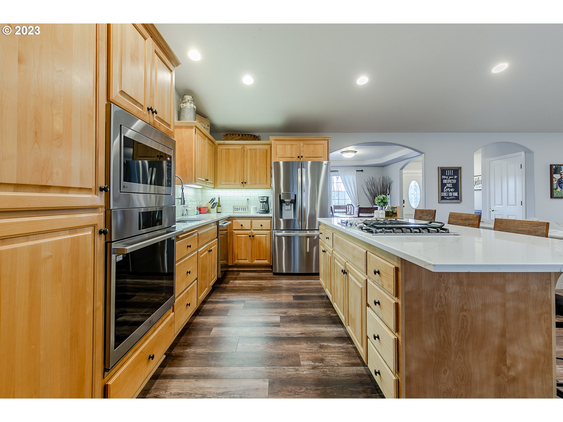 2353 35th Street Springfield, OR 97477 - Photo 10 of 32 a kitchen with stainless steel appliances a sink and counter top