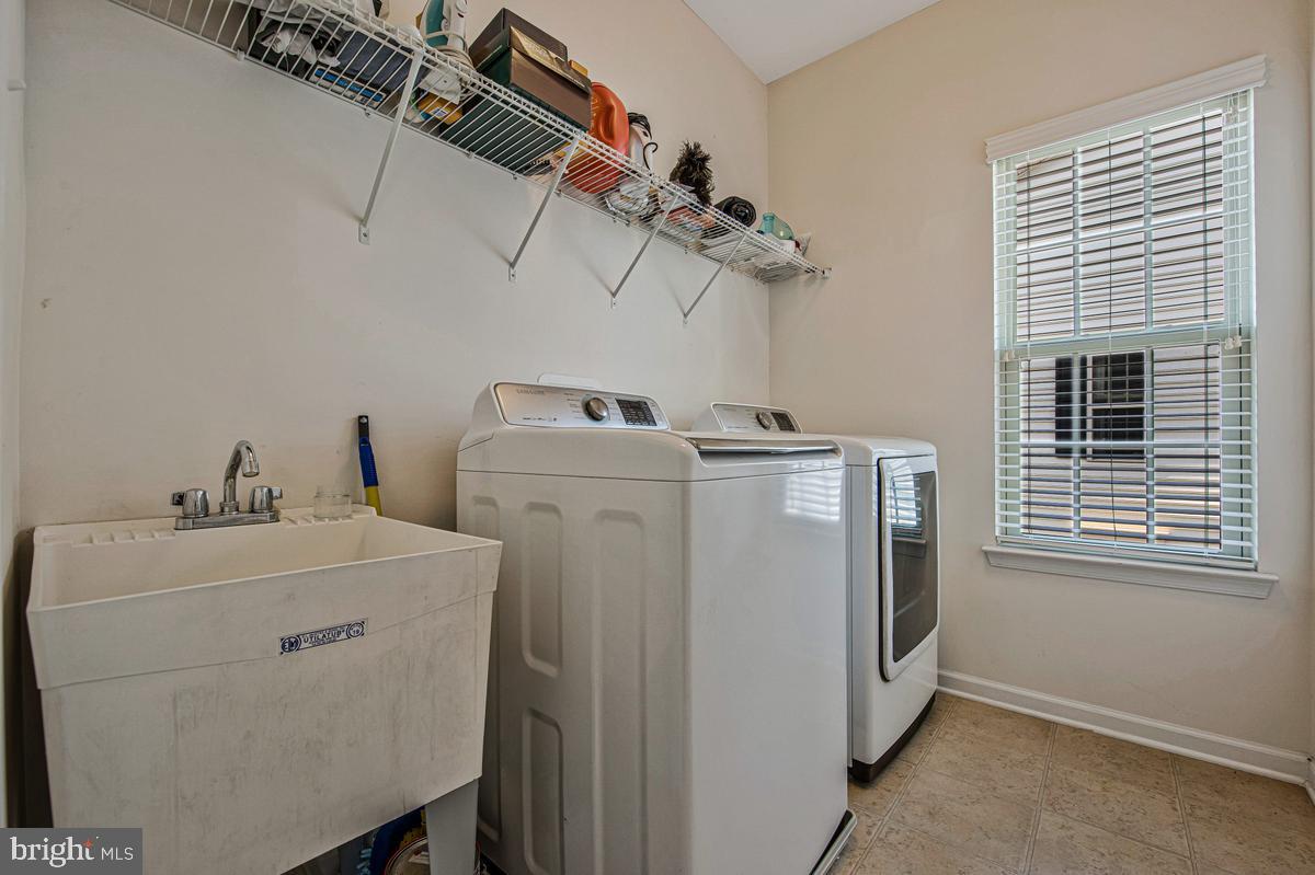 14413 Sandy Ridge Lane Laurel, MD 20707 - Photo 28 of 41 Bright and functional laundry space.