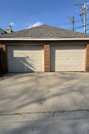 a view of a house with a garage