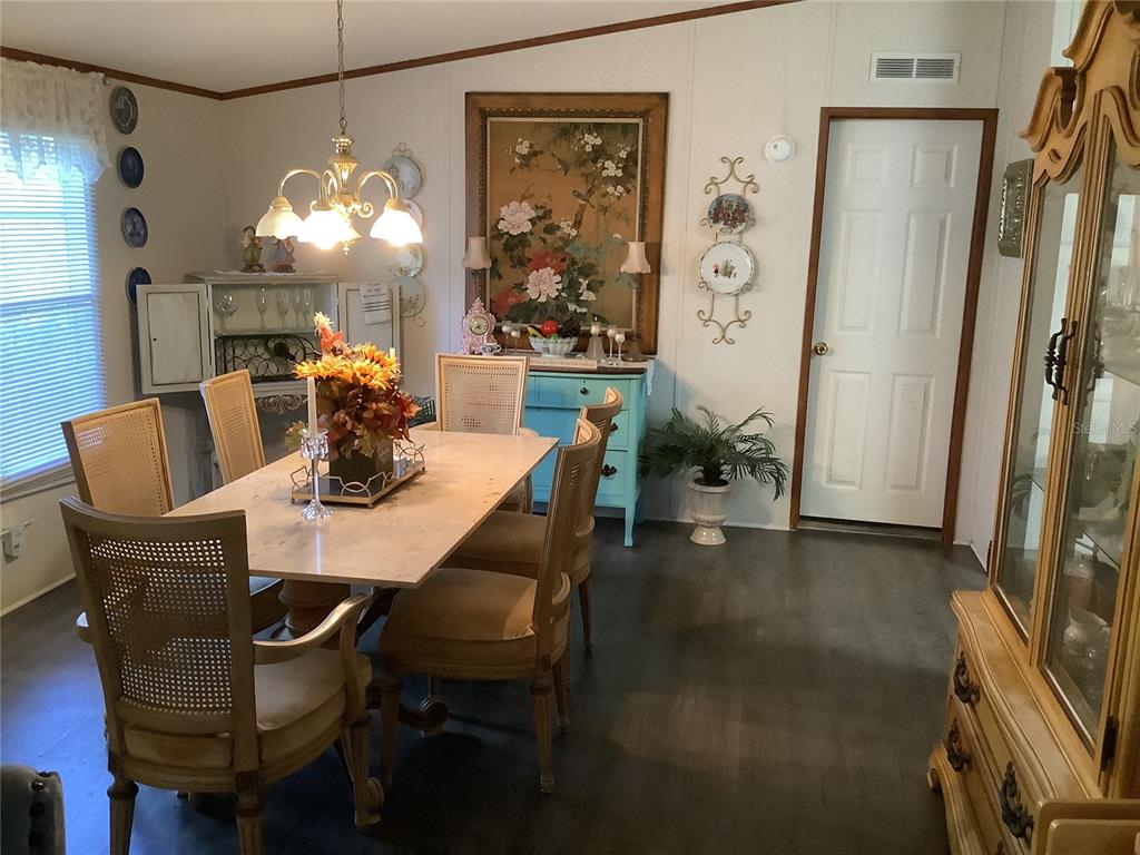 34926 Punch Road Dade City, FL 33523 - Photo 35 of 75 a dining room with furniture and window