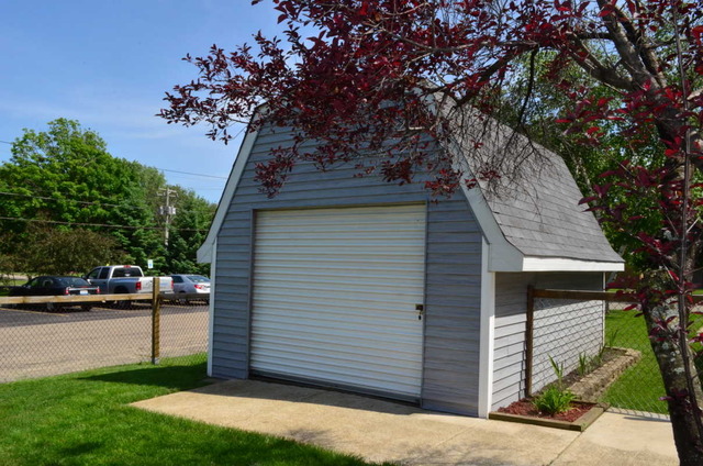 458 East Briarcliff Road Bolingbrook, IL 60440 - Photo 18 of 18 a front view of a house with a garden
