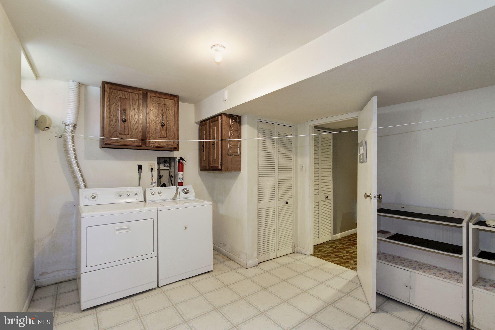 14946 Ladymeade Circle Silver Spring, MD 20906 - Photo 22 of 25 Lower Level Laundry Room and Storage