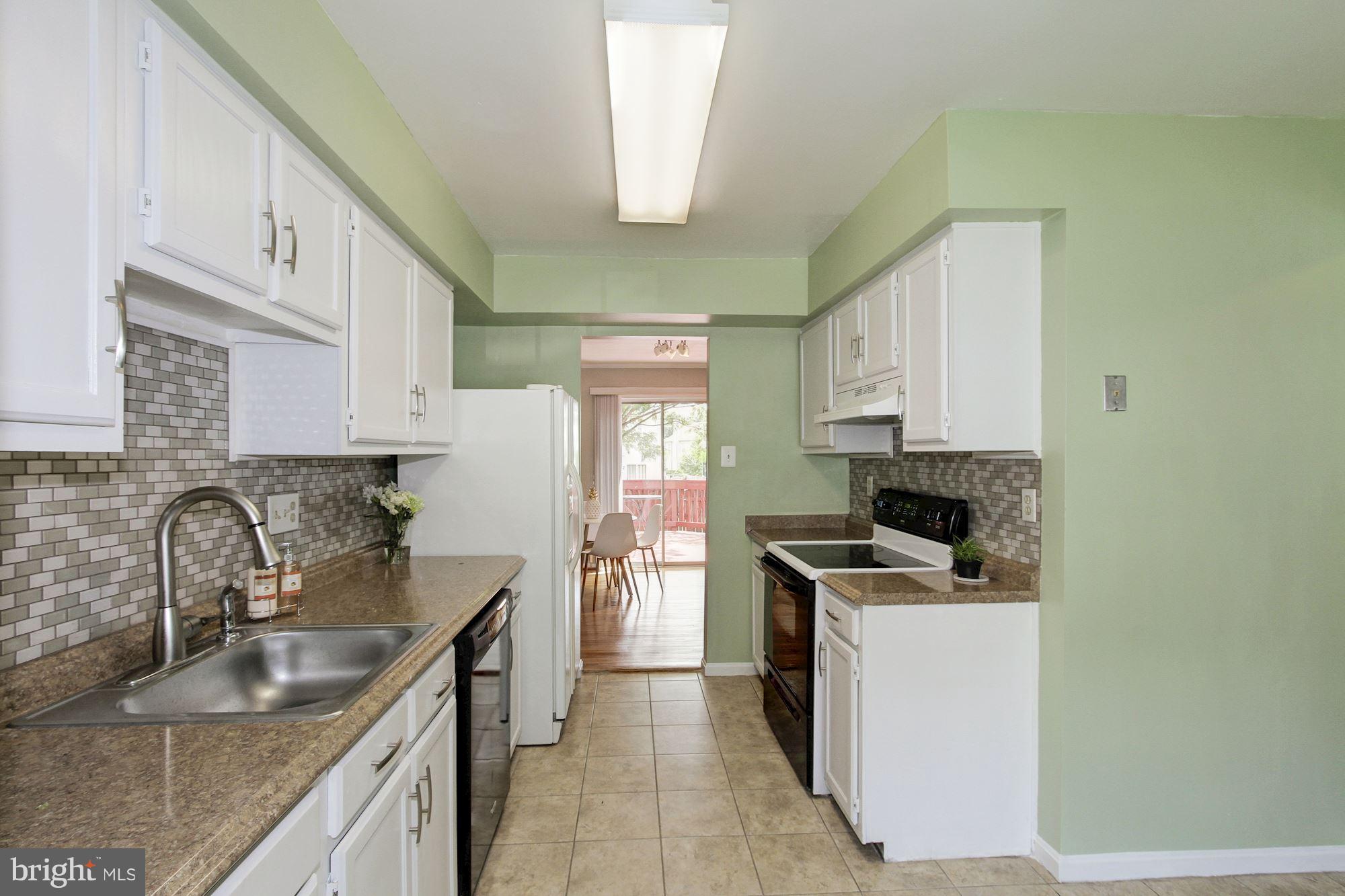 14946 Ladymeade Circle Silver Spring, MD 20906 - Photo 8 of 25 Kitchen Leading to Dining Area