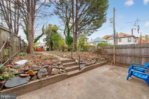 a view of a bench in snow