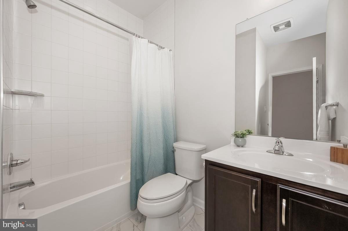 324 Spring Bank Way Frederick, MD 21701 - Photo 32 of 48 a bathroom with a sink a toilet and shower