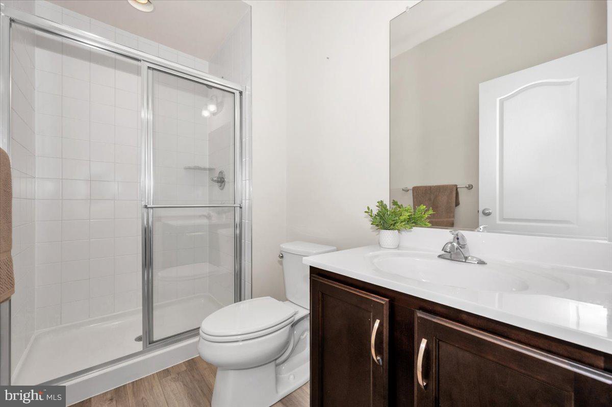 324 Spring Bank Way Frederick, MD 21701 - Photo 36 of 48 a bathroom with a sink a toilet and shower