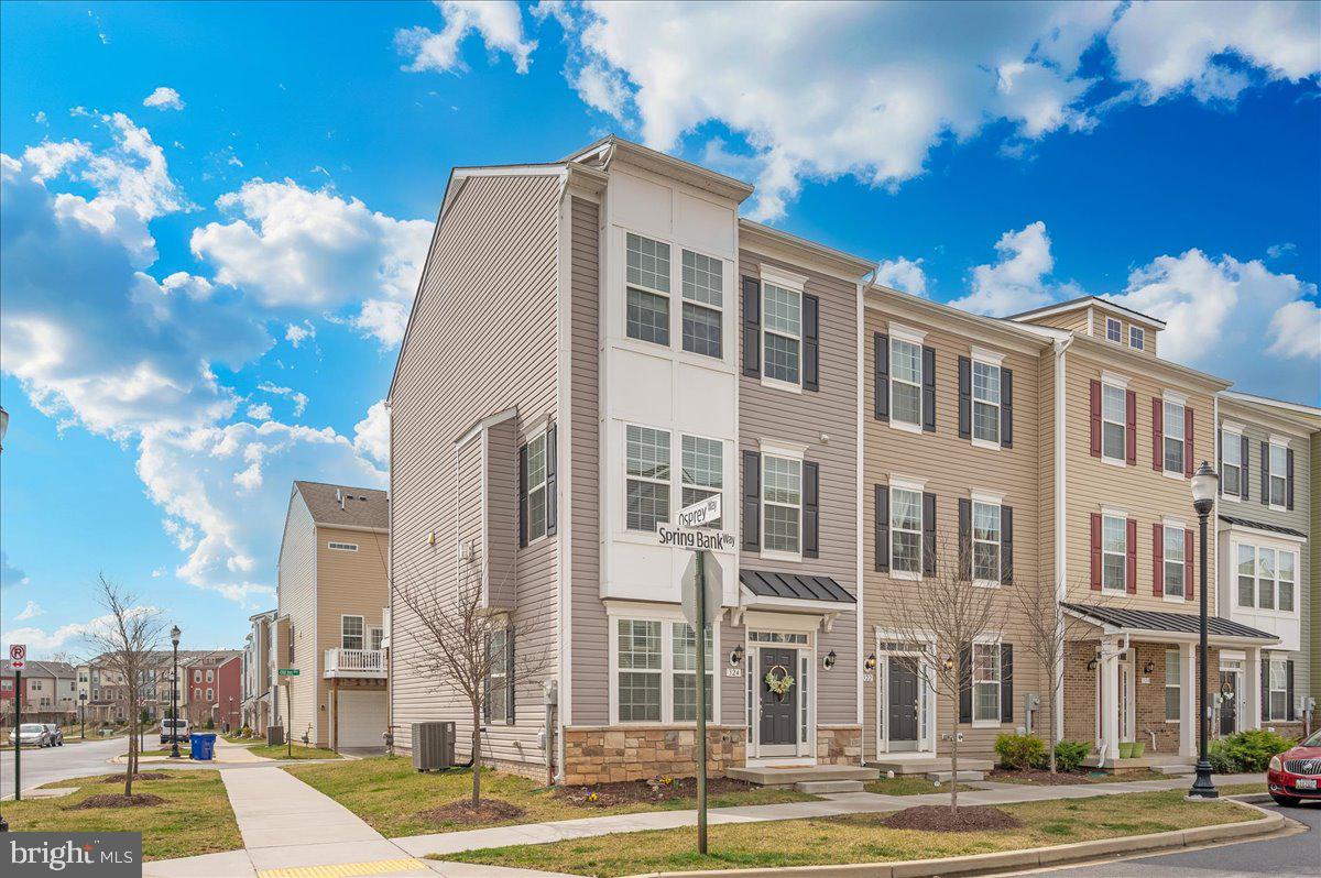 324 Spring Bank Way Frederick, MD 21701 - Photo 44 of 48 a front view of a multi story building