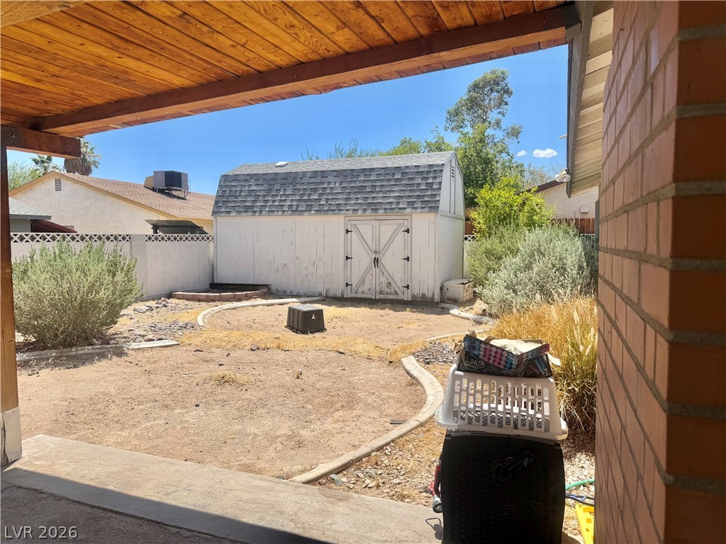 6461 West Viking Road Las Vegas, NV 89103 - Photo 4 of 18 Yard access with tool house