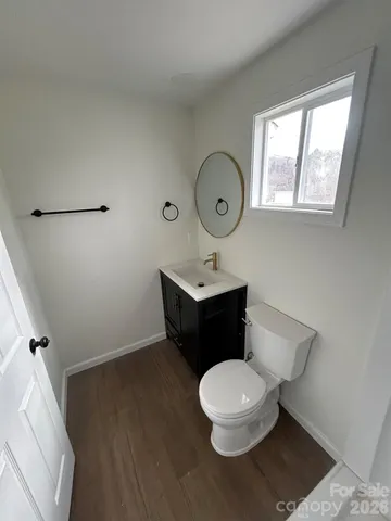 a view of a bathroom from the hallway