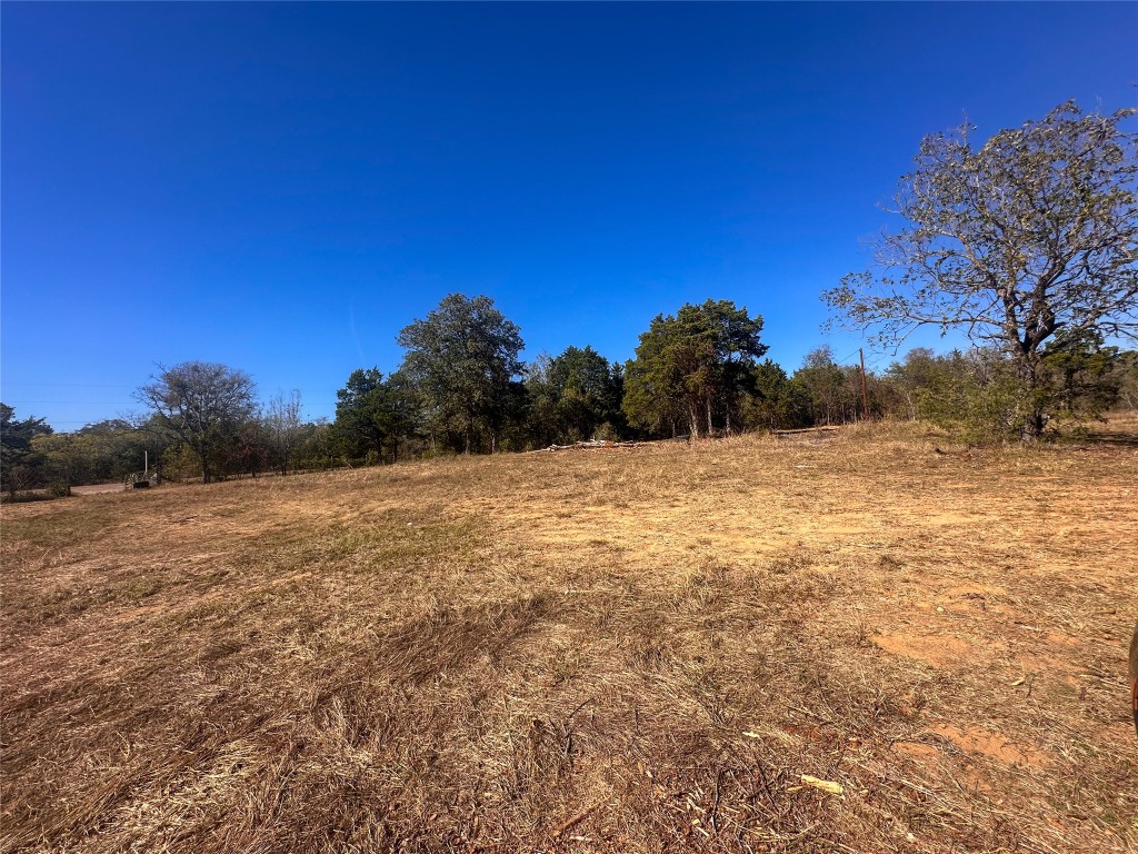 Lot 9 Foothill Road Bastrop, TX 78602 - Photo 5 of 12 a view of a yard with a house