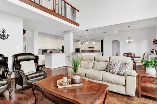 a kitchen with granite countertop a sink and cabinets