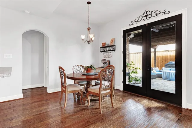 a view of a house with garden and a garden