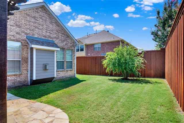 a bedroom with a bed and a fireplace
