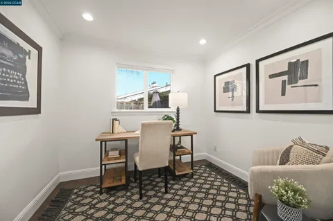 a workspace with furniture and window