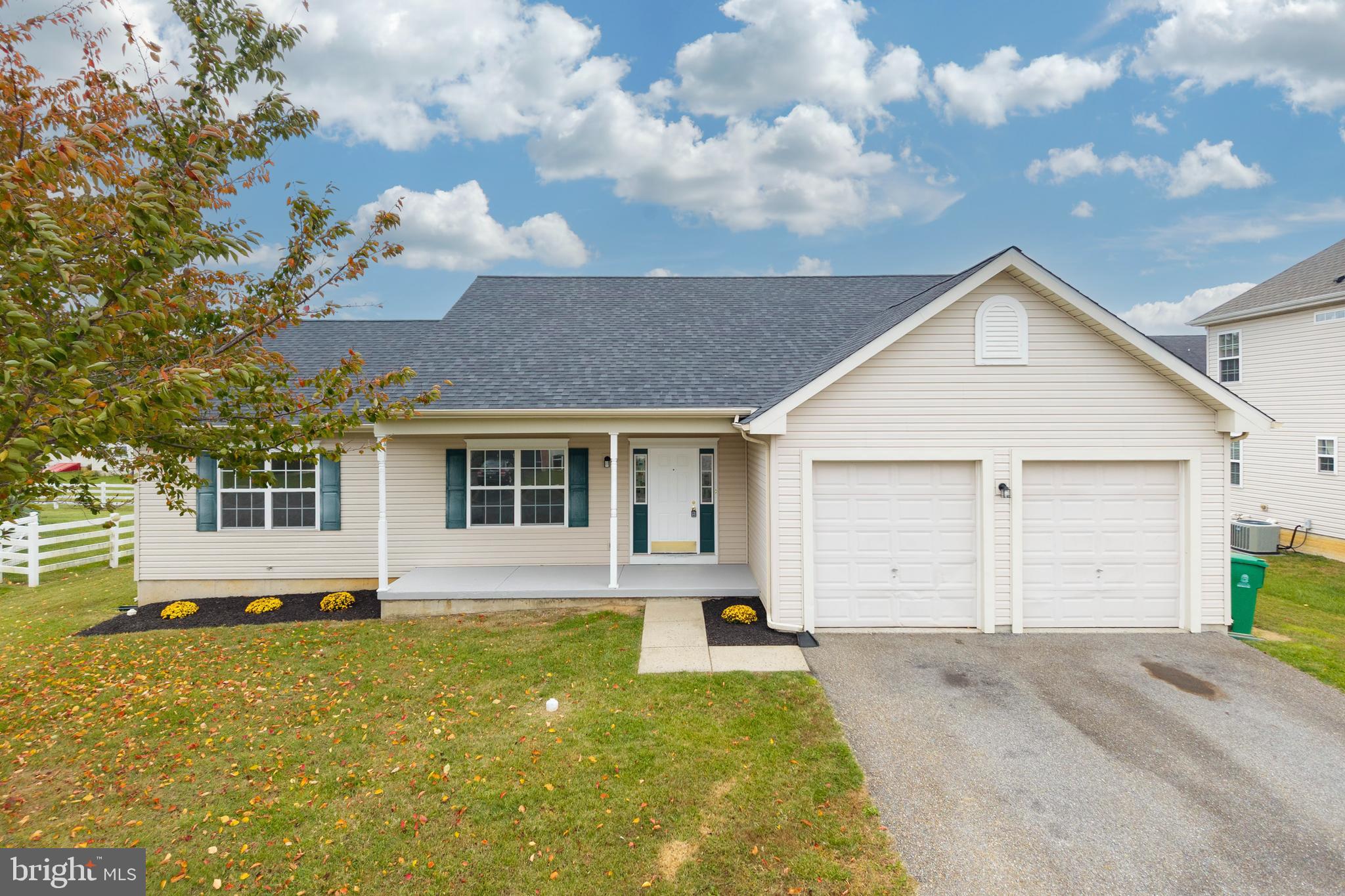 97 Needham Drive Smyrna, DE 19977 - Photo 1 of 52 a view of a white house with a yard and garage