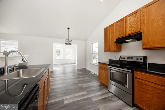 a view of storage and utility room with washer and dryer