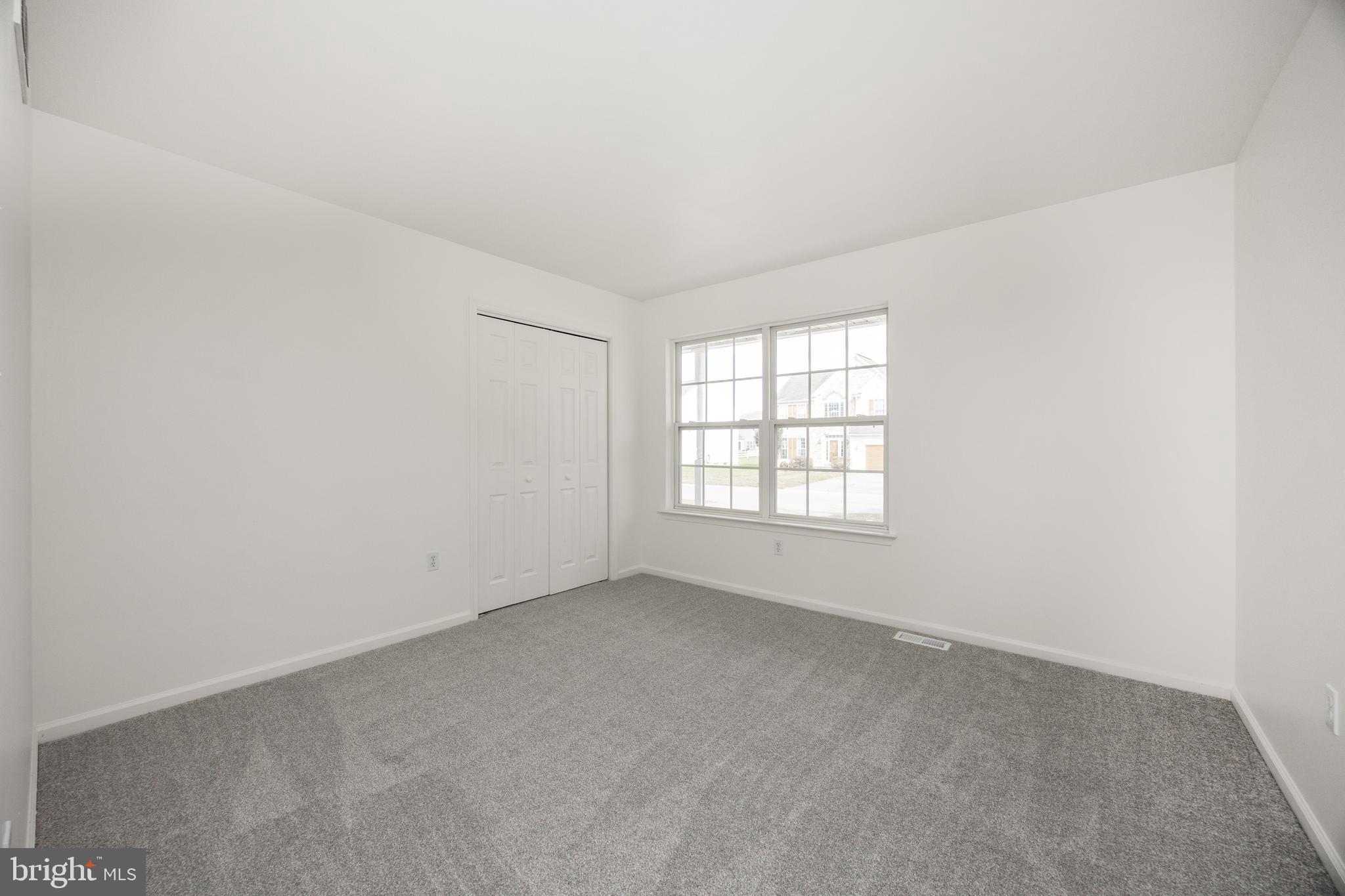 97 Needham Drive Smyrna, DE 19977 - Photo 21 of 52 an empty room with a window