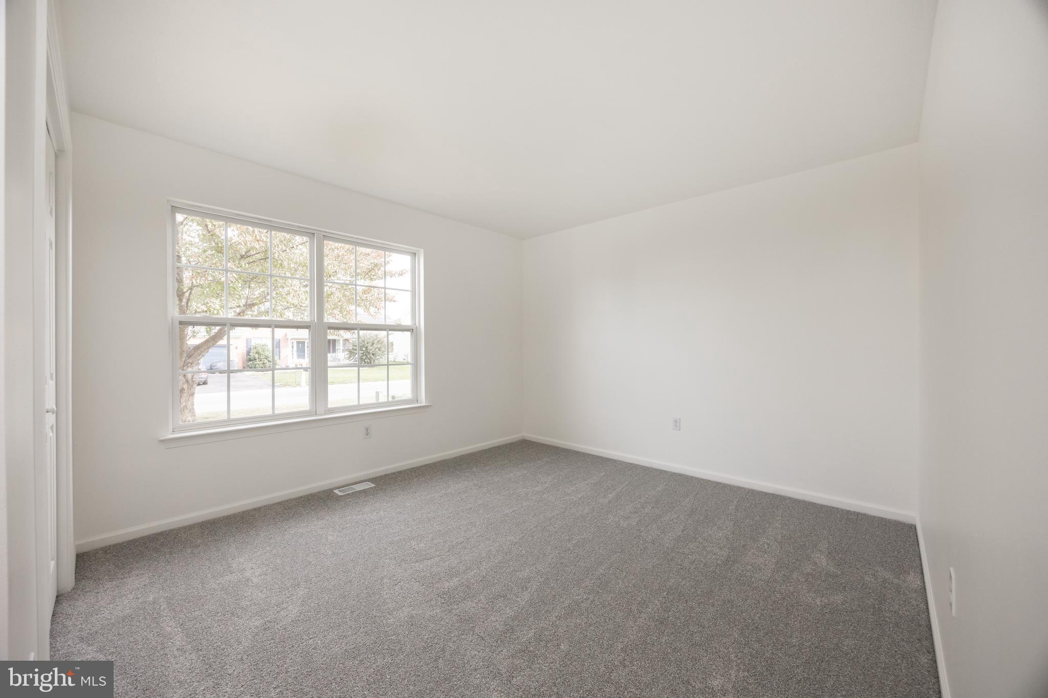 97 Needham Drive Smyrna, DE 19977 - Photo 22 of 52 an empty room with a window