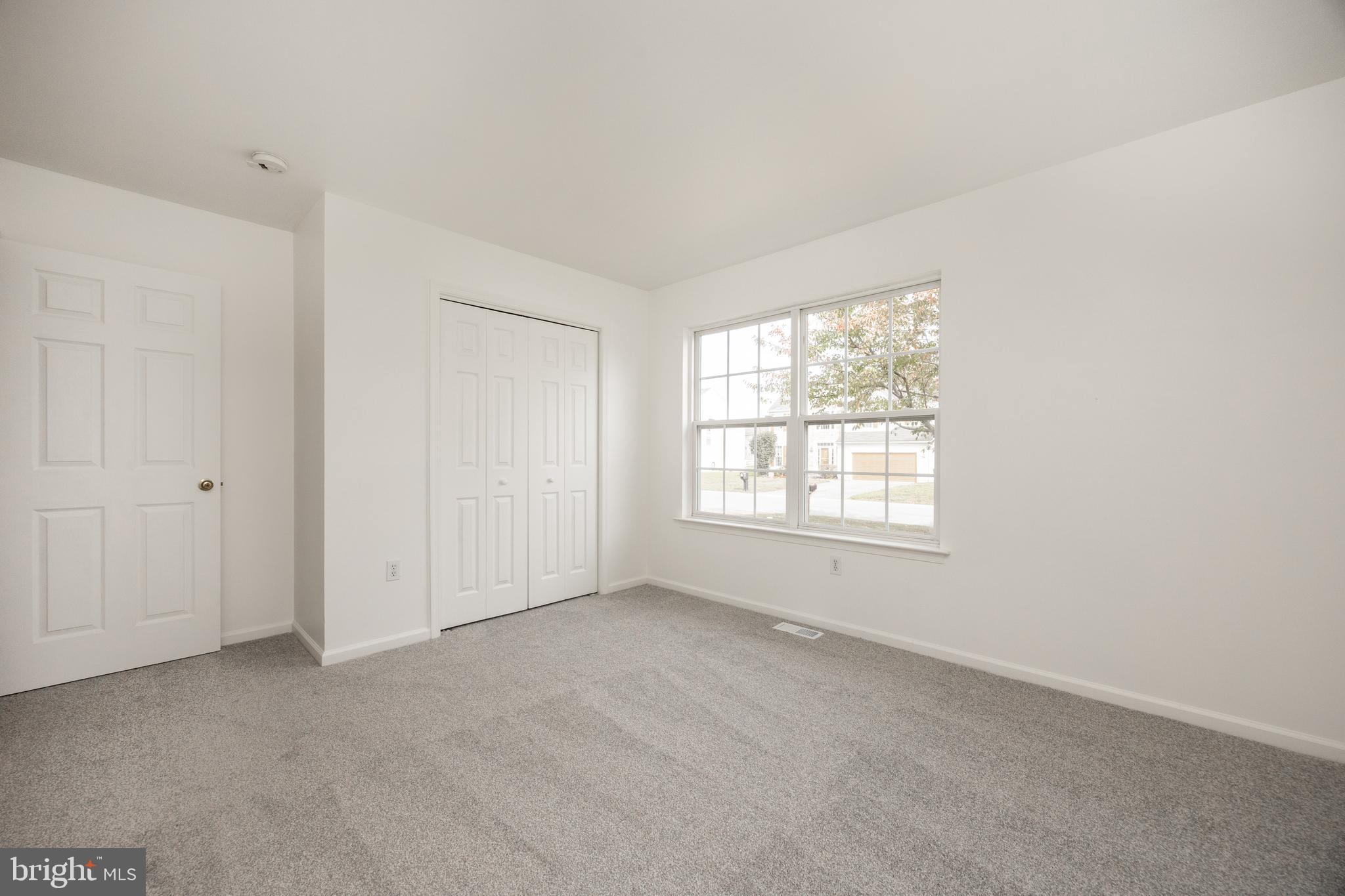 97 Needham Drive Smyrna, DE 19977 - Photo 23 of 52 a view of an empty room with a window