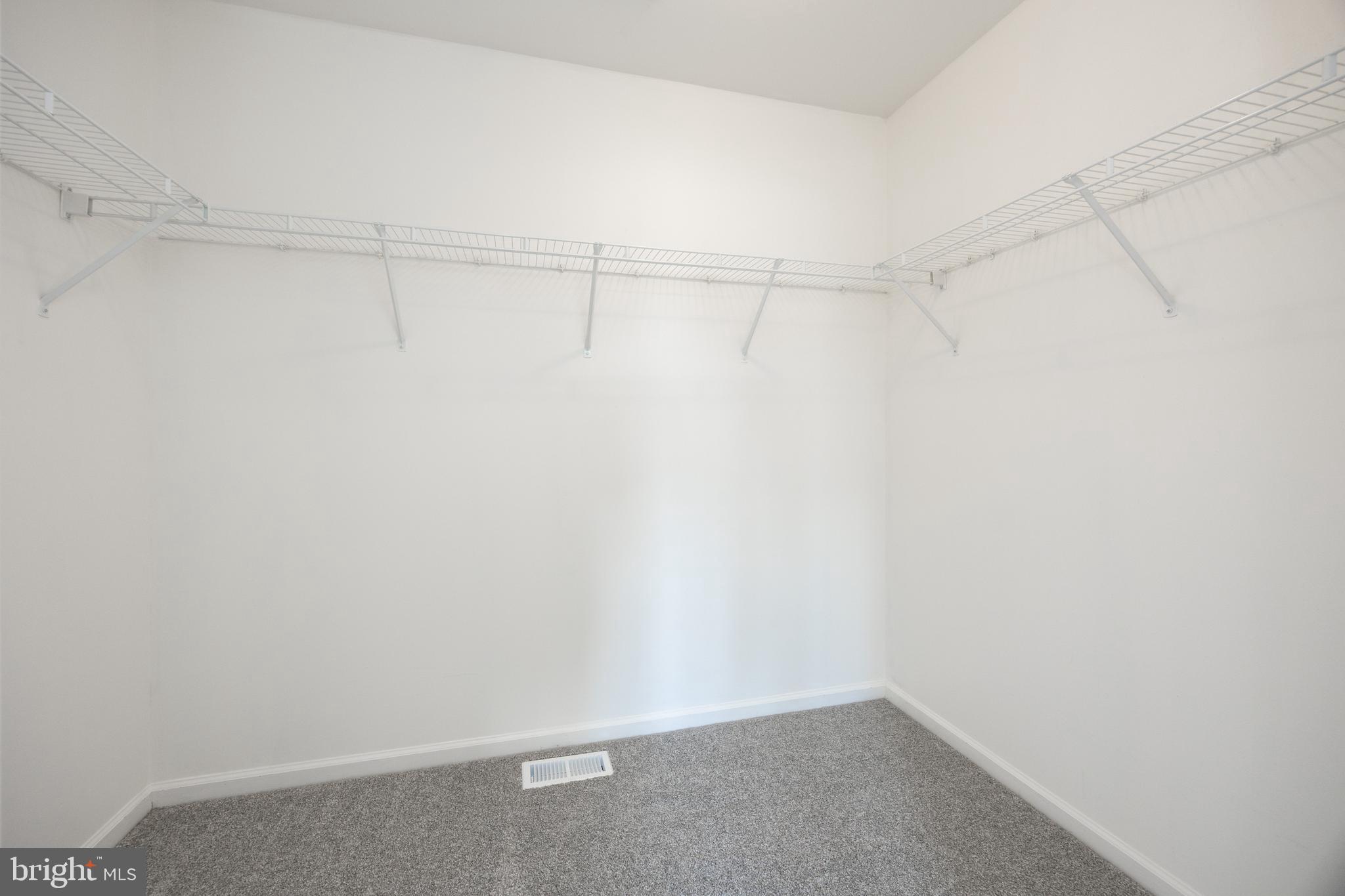 97 Needham Drive Smyrna, DE 19977 - Photo 25 of 52 a view of a room with racks on the wall