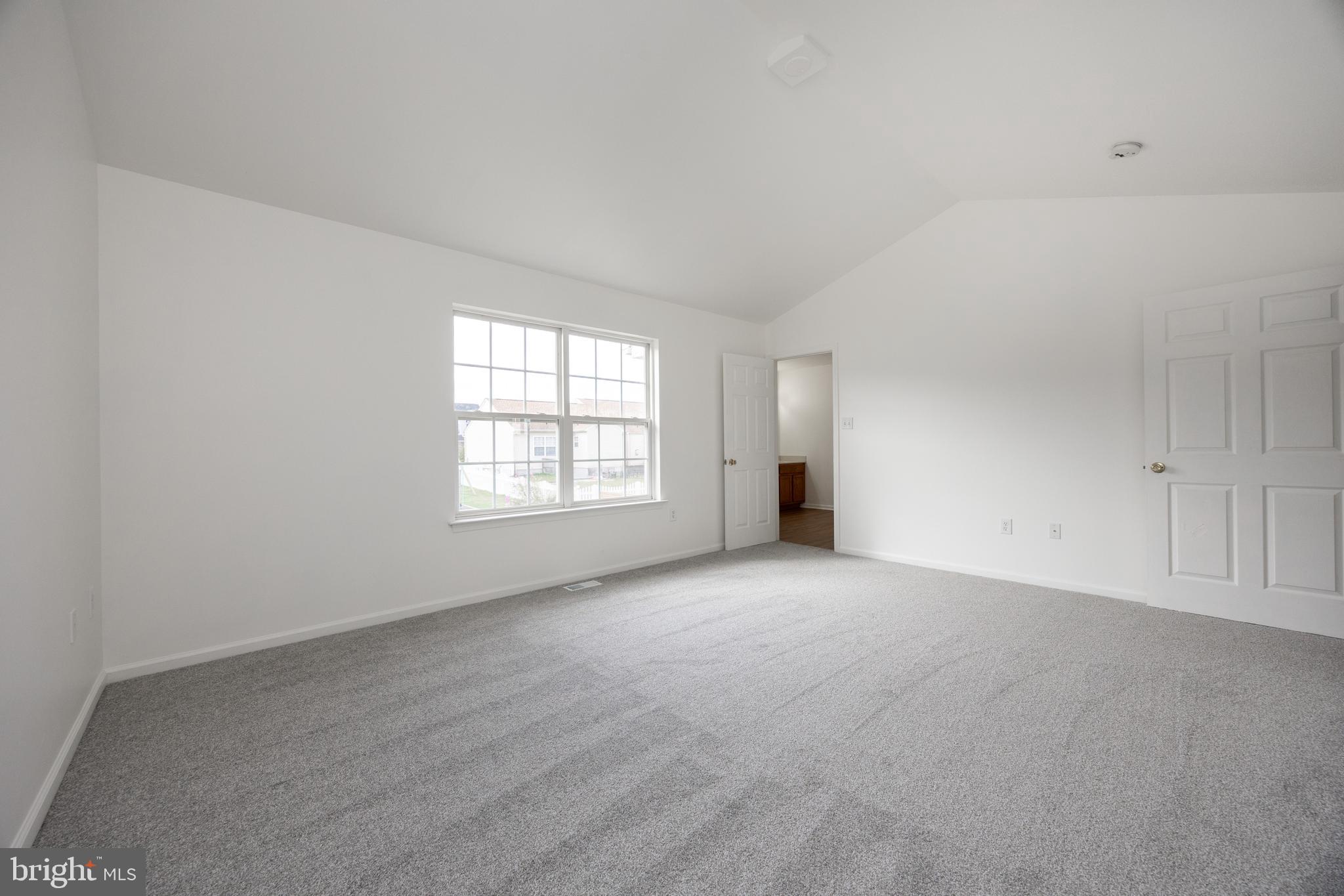 97 Needham Drive Smyrna, DE 19977 - Photo 26 of 52 an empty room with windows