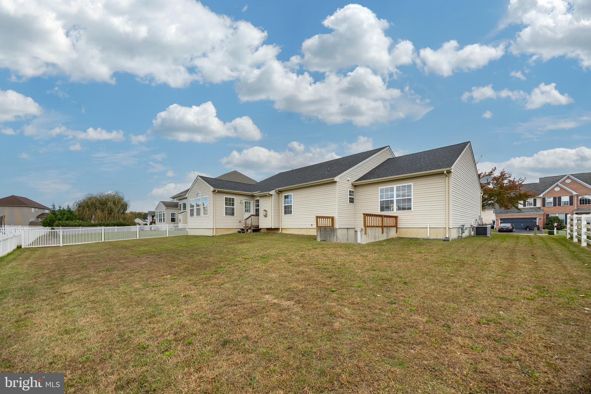 97 Needham Drive Smyrna, DE 19977 - Photo 36 of 52 a view of a house with a yard