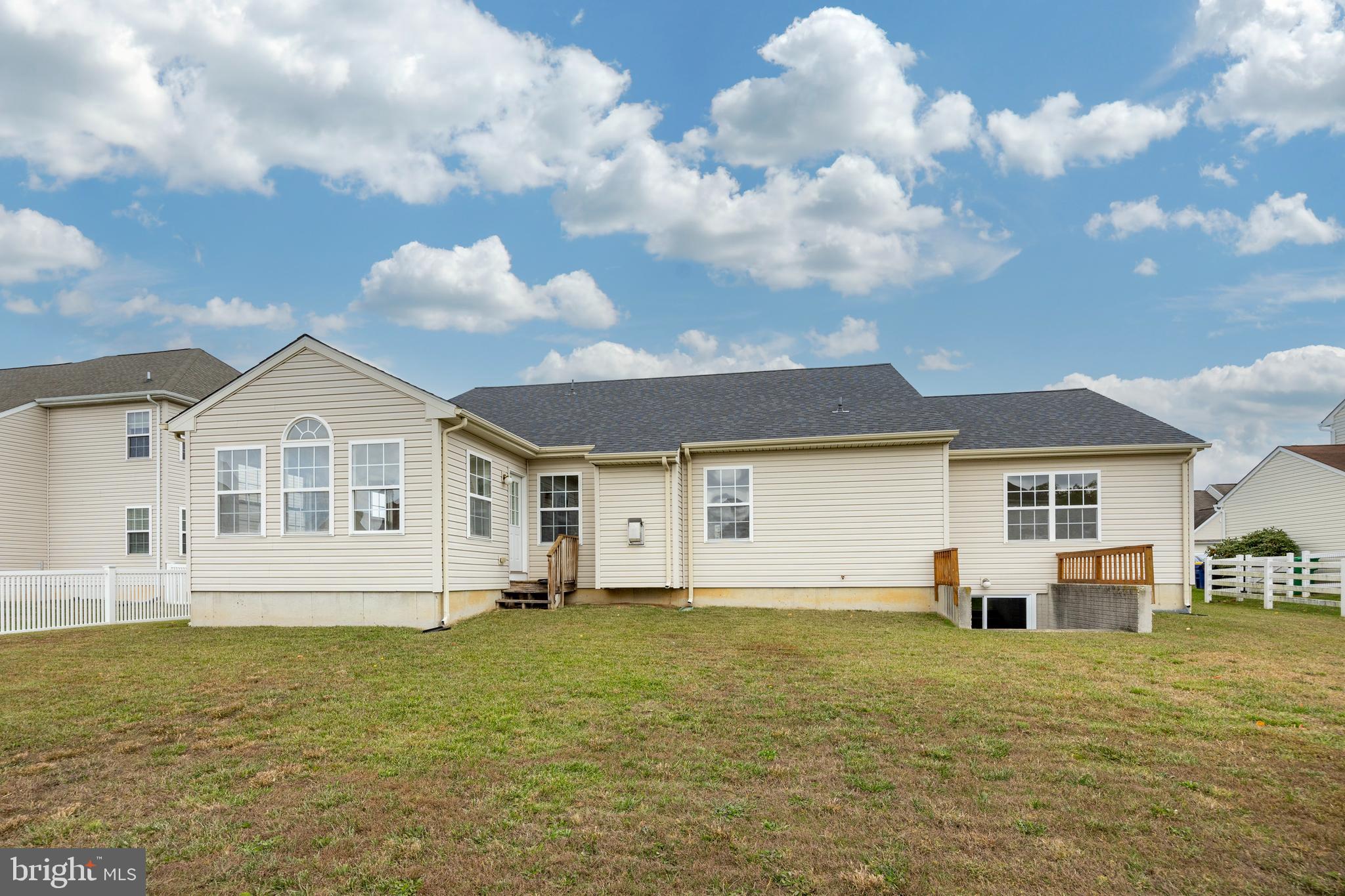 97 Needham Drive Smyrna, DE 19977 - Photo 37 of 52 a front view of a house with garden