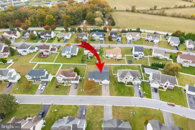 a bathroom with a sink mirror and vanity